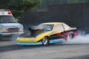 Colorful Beretta Drag Car doing burnout